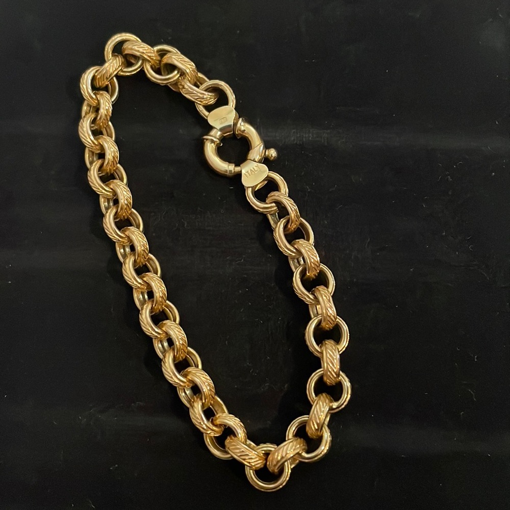 14k Beautiful gold bolts bracelet. Great investment.